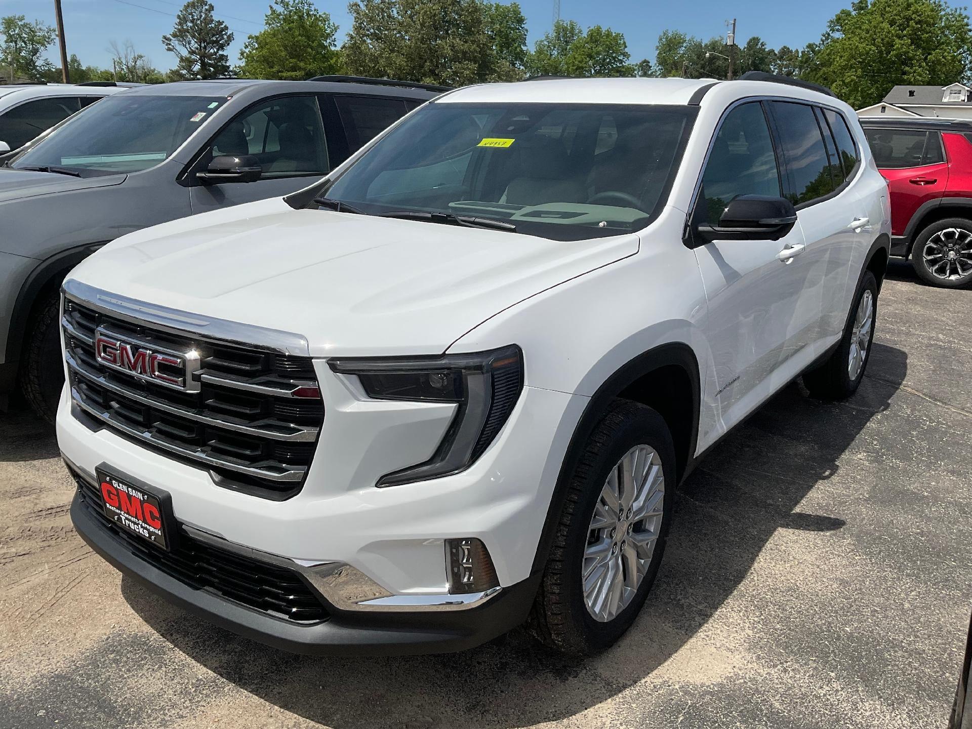 2026 GMC Acadia Elevation in Summit White — front three-quarter view