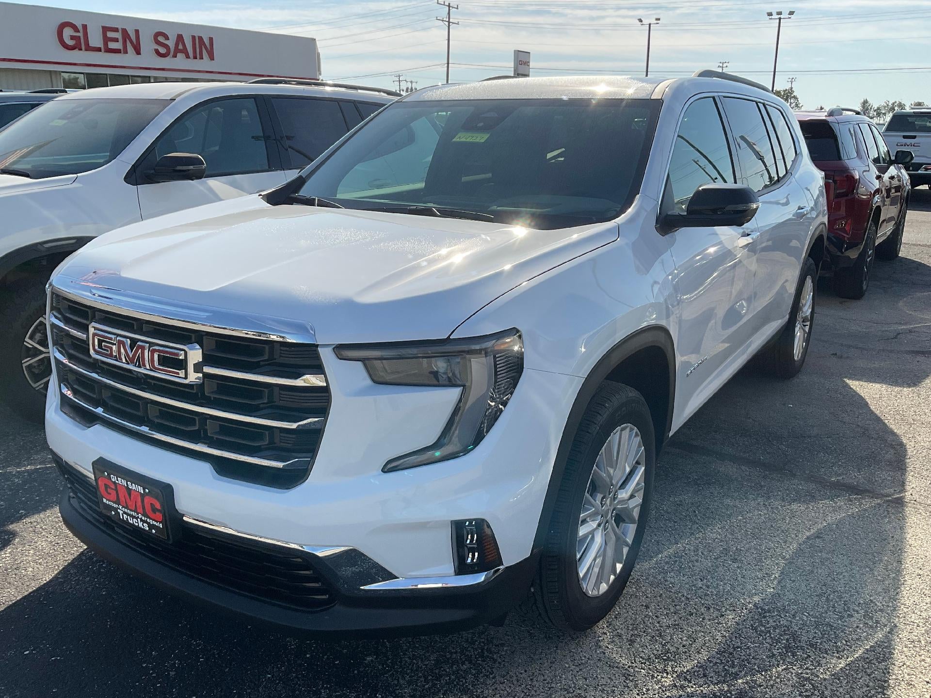 2026 GMC Acadia Elevation in Summit White — front three-quarter view