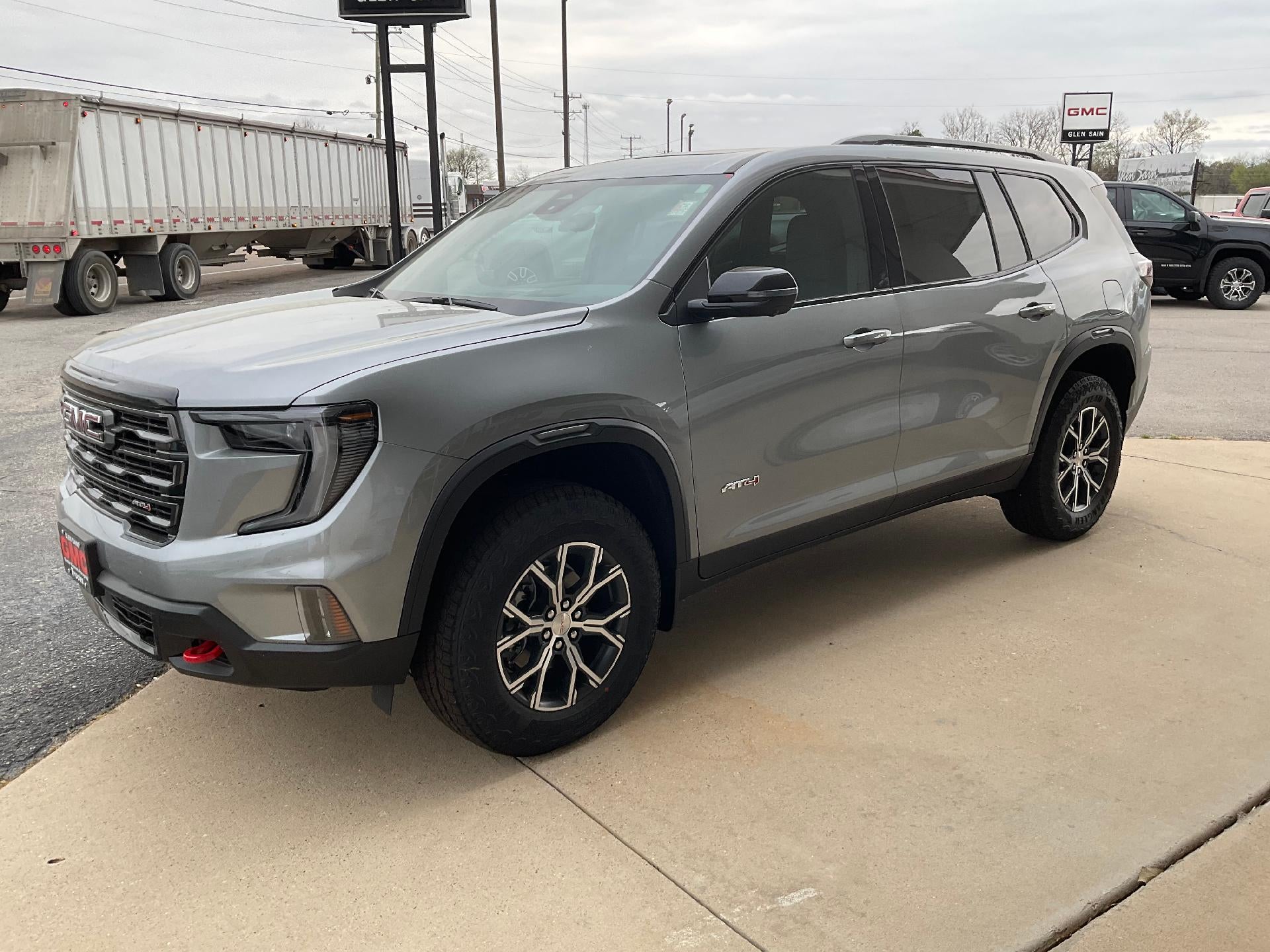 2026 GMC Acadia AT4 in Sterling Metallic — front three-quarter view