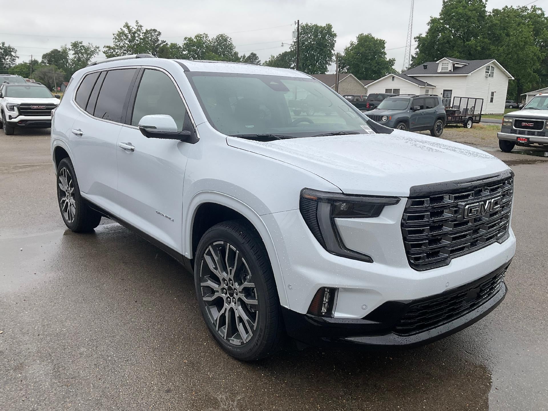 2026 GMC Acadia Denali Ultimate in Glacier White Tricoat — front three-quarter view