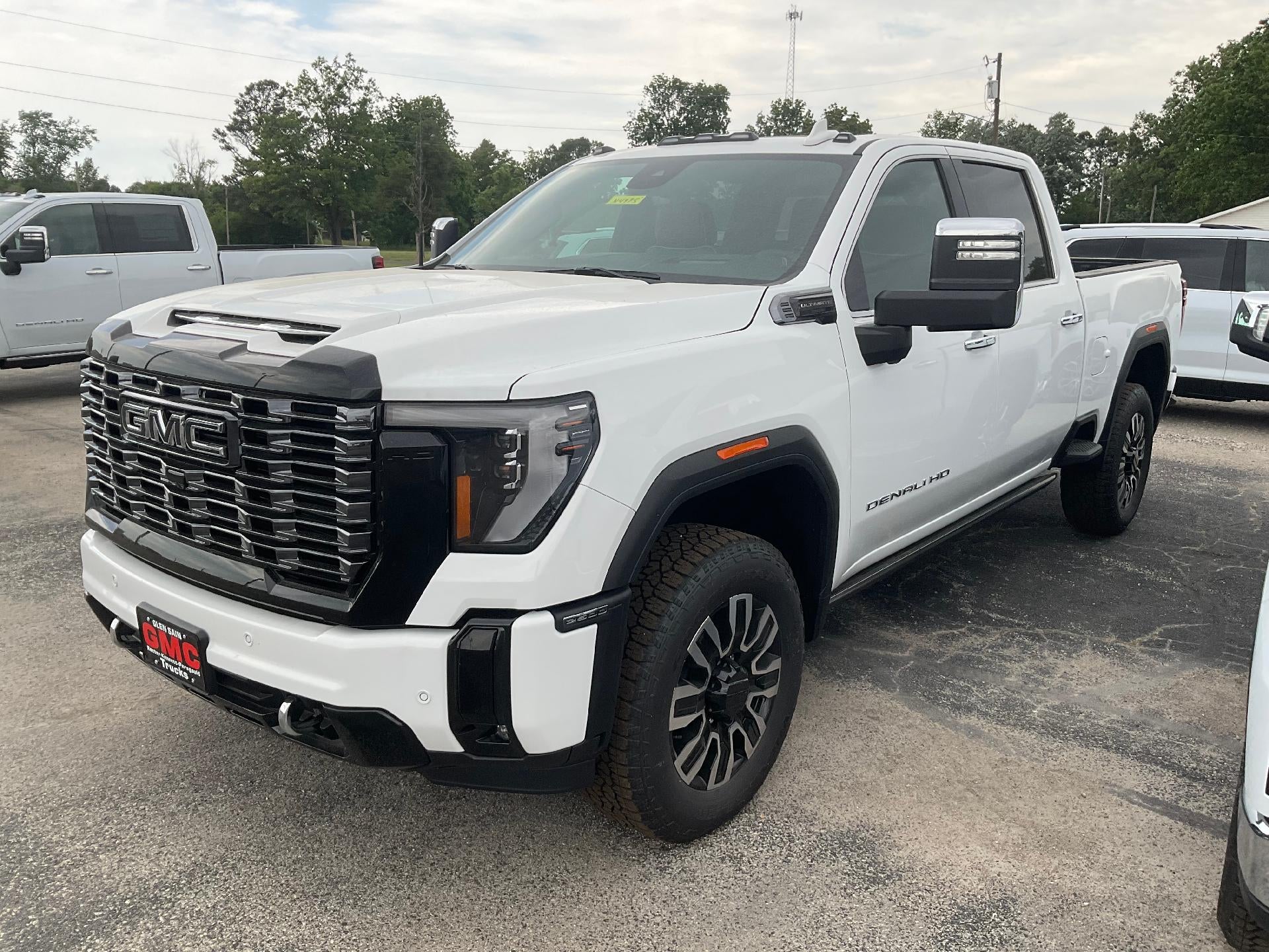 2026 GMC Sierra 2500 HD Denali Ultimate in Summit White — front three-quarter view