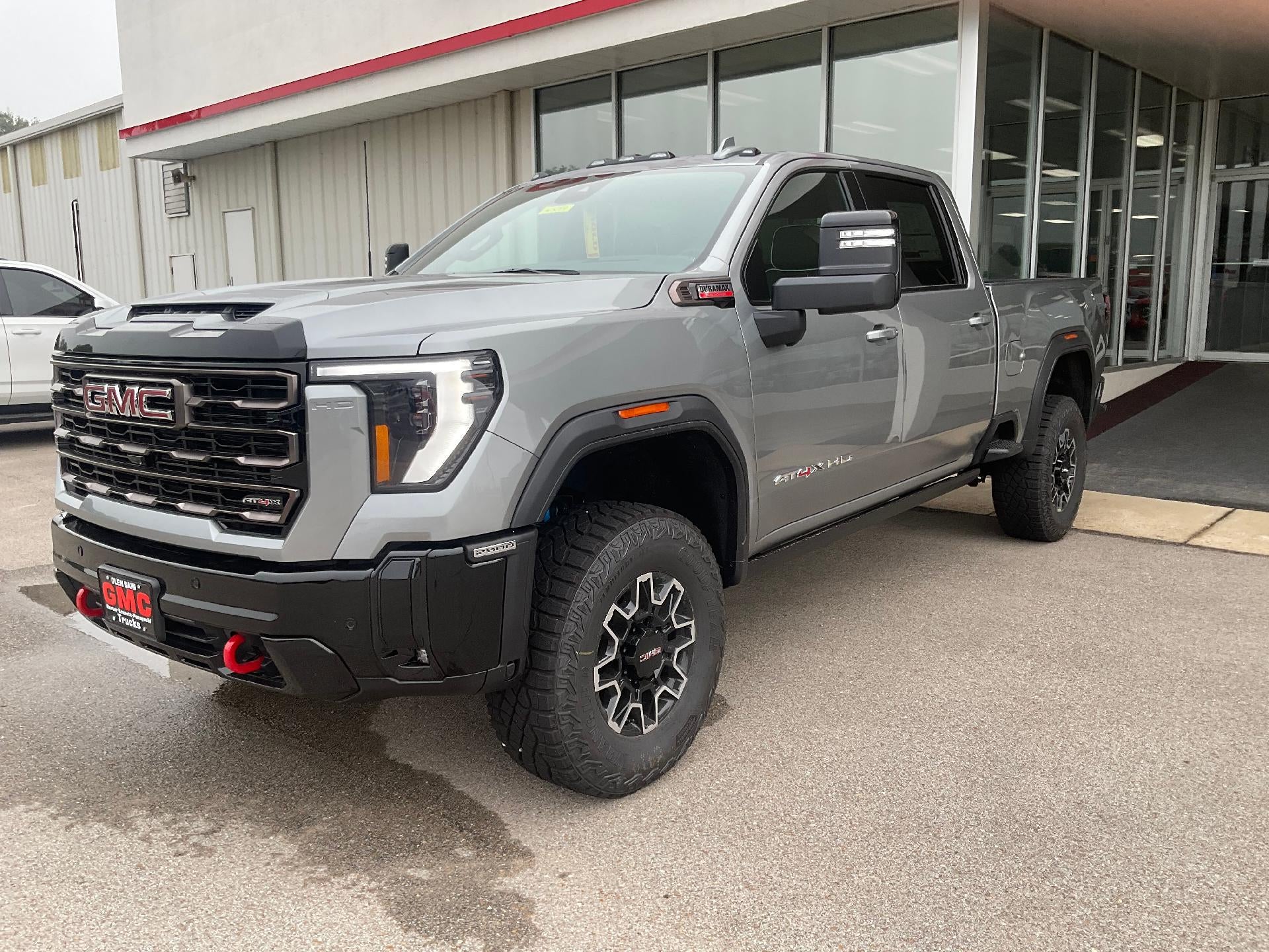 2026 GMC Sierra 2500 HD AT4X in Sterling Metallic — front three-quarter view