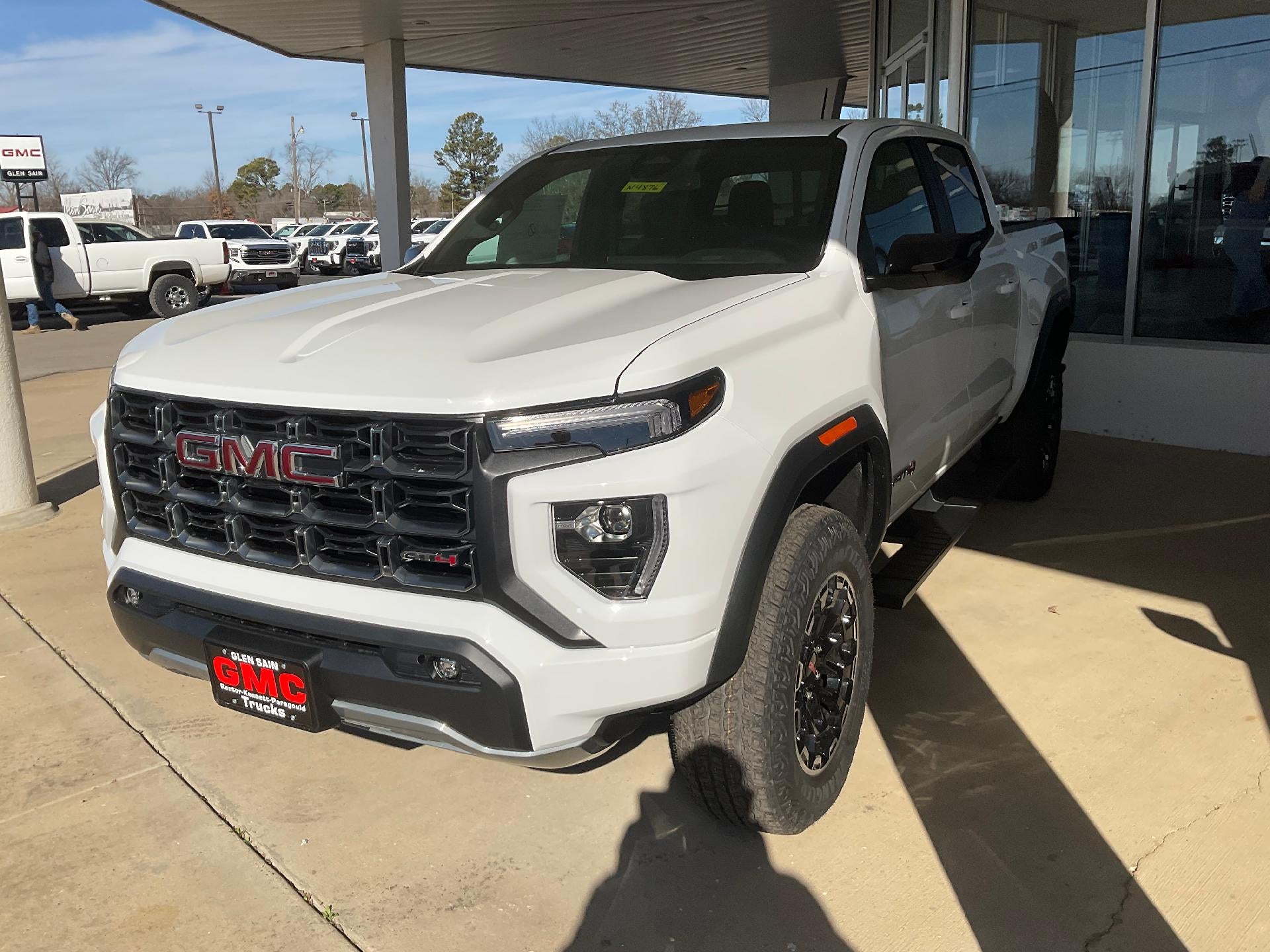 2026 GMC Canyon AT4 in Summit White — front three-quarter view