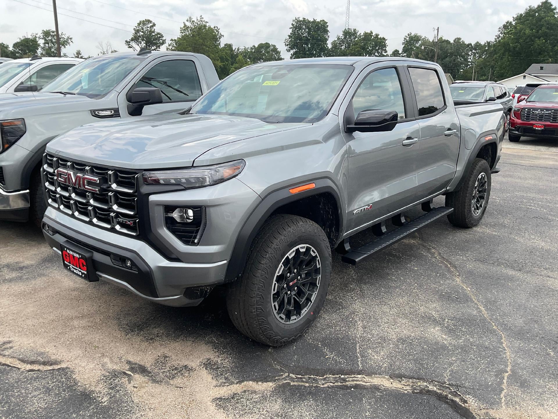 2026 GMC Canyon AT4 in Sterling Metallic — front three-quarter view
