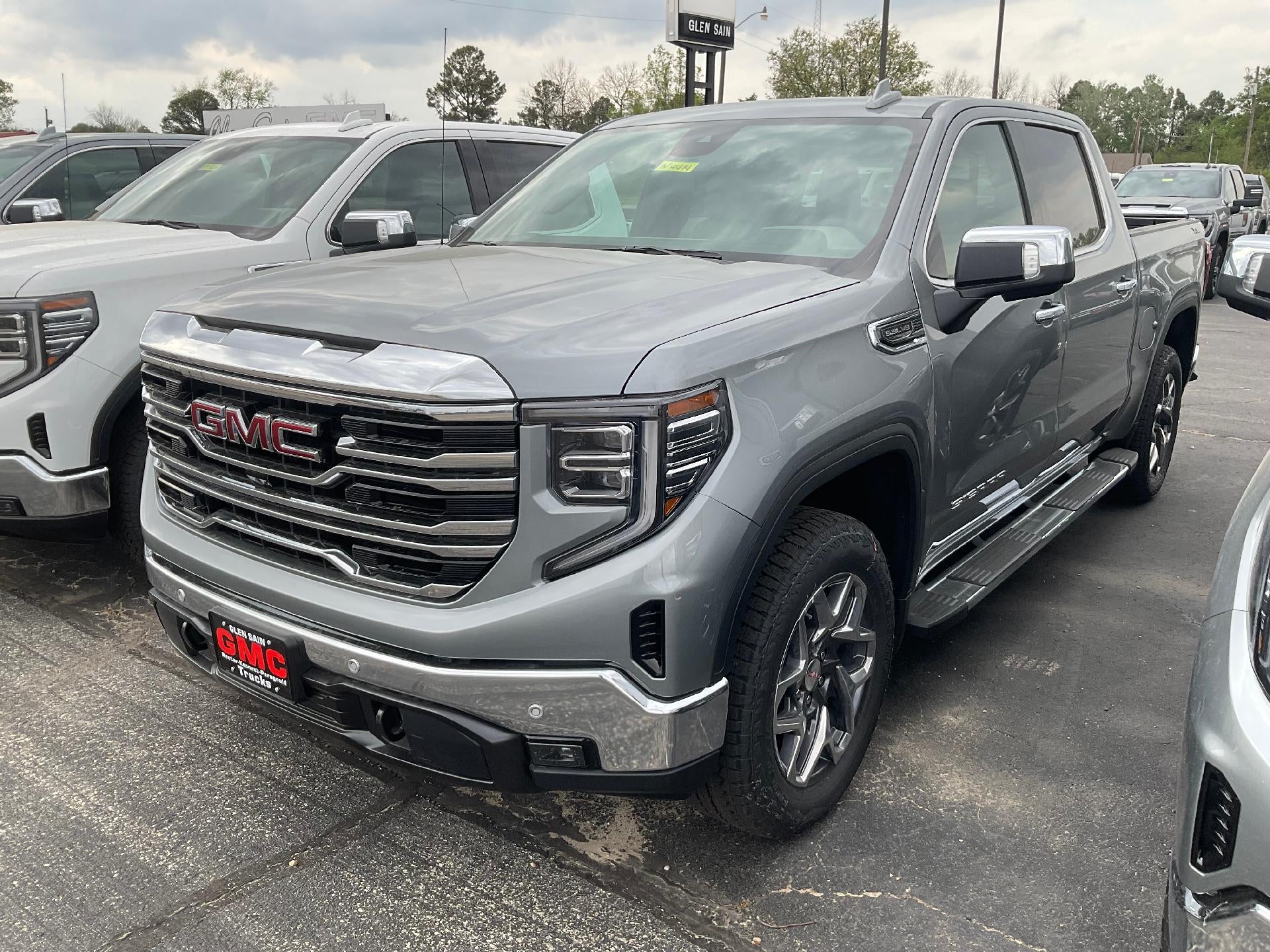 2026 GMC Sierra 1500 SLT in Sterling Metallic — front three-quarter view