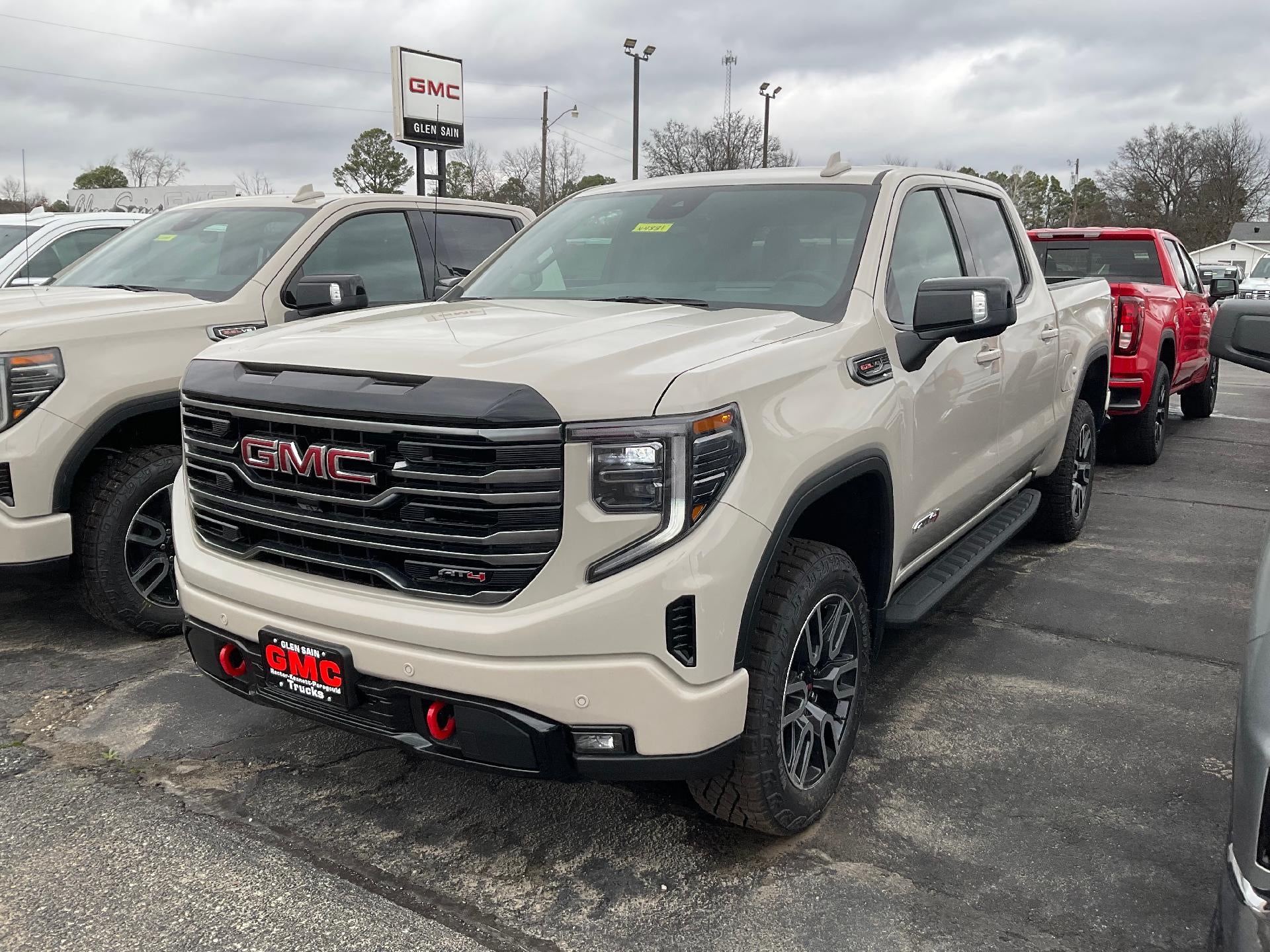 2026 GMC Sierra 1500 AT4 in Coastal Dune — front three-quarter view